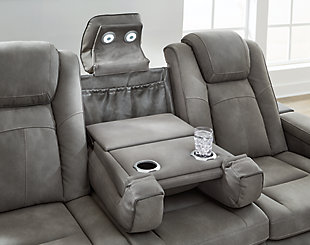 The sleek, ultra-modern Next-Gen DuraPella power reclining sofa has it all. With designer looks and head-to-toe comfort, it has the upscale look of leather at a scaled-down faux leather price. Its gray two-tone upholstery is more durable and water-repellent than regular leather, an added bonus for families with children or pets. Features including wireless and USB charging, an adjustable headrest and a "zero-gravity" feature for improved circulation make this the next generation of power recliners.Dual-sided recliner; middle seat remains stationary | One-touch power control with adjustable positions, Easy View™ adjustable headrest and zero-draw USB plug-in | Zero-draw technology only consumes power when the USB receptacle is in use | Zero-gravity mechanism allows optimum reclining comfort with infinite reclining positions at the touch of a button | Easy View™ adjustable headrest puts your head and neck in optimum position for reading or watching TV even if you're fully reclined | Extended ottoman for enhanced comfort | Wireless and USB charging | Reading lights | Corner-blocked frame with metal reinforced seats | Attached cushions | High-resiliency foam cushions wrapped in thick poly fiber | Water-repellent polyester/polyurethane (faux leather) upholstery | Drop-down table with storage pouch, 2 reading lights and 2-stage cup holders that convert to a flat surface for coffee mugs | Estimated Assembly Time: 15 Minutes