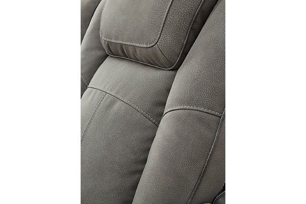 The sleek, ultra-modern Next-Gen DuraPella power recliner has it all. With designer looks and head-to-toe comfort, it has the upscale look of leather at a scaled-down faux leather price. Its gray two-tone upholstery is more durable and water-repellent than regular leather, an added bonus for families with children or pets. Features including wireless and USB charging, an adjustable headrest and an extended "zero-gravity" ottoman for improved circulation make this the next generation of power recliners.Dual-sided recliner | One-touch power control with adjustable positions, Easy View™ adjustable headrest, extended ottoman and zero-draw USB plug-in | Zero-draw technology only consumes power when the USB receptacle is in use | Zero-gravity mechanism allows optimum reclining comfort with infinite reclining positions at the touch of a button | Easy View™ adjustable headrest puts your head and neck in optimum position for reading or watching TV even if you're fully reclined | Extended ottoman for enhanced comfort | Wireless and USB charging | Corner-blocked frame with metal reinforced seat | Attached cushions | High-resiliency foam cushions wrapped in thick poly fiber | Water-repellent polyester/polyurethane (faux leather) upholstery | Wireless and USB charging | Center console with storage compartment and 2-stage cupholders that convert to a flat surface for coffee mugs | Estimated Assembly Time: 15 Minutes