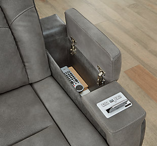 The sleek, ultra-modern Next-Gen DuraPella power reclining sofa has it all. With designer looks and head-to-toe comfort, it has the upscale look of leather at a scaled-down faux leather price. Its gray two-tone upholstery is more durable and water-repellent than regular leather, an added bonus for families with children or pets. Features including wireless and USB charging, an adjustable headrest and a "zero-gravity" feature for improved circulation make this the next generation of power recliners.Dual-sided recliner; middle seat remains stationary | One-touch power control with adjustable positions, Easy View™ adjustable headrest and zero-draw USB plug-in | Zero-draw technology only consumes power when the USB receptacle is in use | Zero-gravity mechanism allows optimum reclining comfort with infinite reclining positions at the touch of a button | Easy View™ adjustable headrest puts your head and neck in optimum position for reading or watching TV even if you're fully reclined | Extended ottoman for enhanced comfort | Wireless and USB charging | Reading lights | Corner-blocked frame with metal reinforced seats | Attached cushions | High-resiliency foam cushions wrapped in thick poly fiber | Water-repellent polyester/polyurethane (faux leather) upholstery | Drop-down table with storage pouch, 2 reading lights and 2-stage cup holders that convert to a flat surface for coffee mugs | Estimated Assembly Time: 15 Minutes