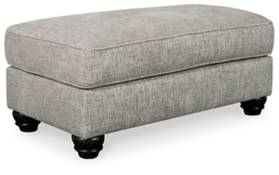 A triumph in transitional design, the Morren ottoman invites you to indulge in eye-catching texture and cozy comfort. Easy on the eyes and plush to the touch, this generously scaled ottoman is covered in a soothing neutral-tone upholstery paired with elegant bun feet for a polished aesthetic.Corner-blocked frame | Firmly cushioned | High-resiliency foam cushion wrapped in thick poly fiber | Polyester upholstery | Exposed feet with faux wood finish