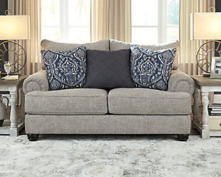 A triumph in transitional design, the Morren sofa and loveseat invite you to indulge in eye-catching texture and cozy comfort. Flared roll arms and loose, reversible cushions give this classically styled living room set a sense of everyday ease. Soothing blue-hue accent pillows add a wonderful layer of interest.Includes 2 pieces: sofa and loveseat | Corner-blocked frame | Loose, reversible cushions | High-resiliency foam cushions wrapped in thick poly fiber | 8 decorative pillows included | Polyester upholstery | Polyester; polyester/cotton/rayon; polyester/cotton pillows | Exposed feet with faux wood finish | Platform foundation system resists sagging 3x better than spring system after 20,000 testing cycles by providing more even support | Smooth platform foundation maintains tight, wrinkle-free look without dips or sags that can occur over time with sinuous spring foundations