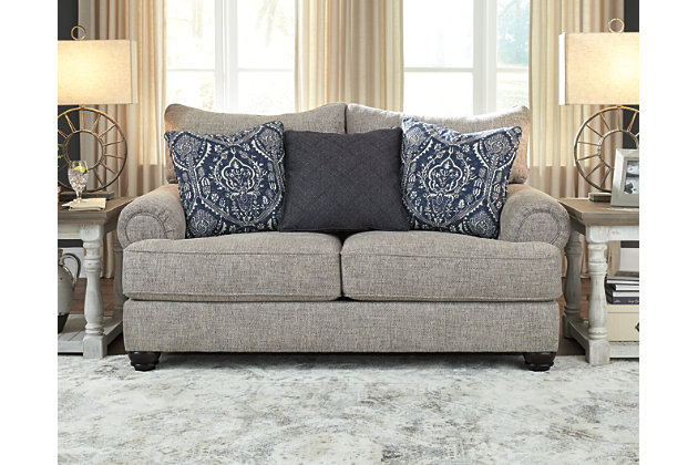 A triumph in transitional design, the Morren loveseat invites you to indulge in eye-catching texture and cozy comfort. Flared roll arms and loose, reversible cushions give this classically styled loveseat a sense of everyday ease. Soothing blue-hue accent pillows add a wonderful layer of interest.Corner-blocked frame | Loose, reversible cushions | High-resiliency foam cushions wrapped in thick poly fiber | 3 accent pillows included | Polyester upholstery | Polyester and polyester/cotton/rayon pillows | Exposed feet with faux wood finish | Platform foundation system resists sagging 3x better than spring system after 20,000 testing cycles by providing more even support | Smooth platform foundation maintains tight, wrinkle-free look without dips or sags that can occur over time with sinuous spring foundations