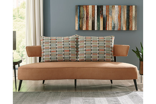 Cool takes a new shape in your living room with the Hollyann sofa. Rounding out your stylish, urban space, this piece sports a velvety soft upholstery and sleek, tapered legs. Curl up with comfort, and really turn around your home decor.Corner-blocked frame | Attached cushions | High-resiliency foam cushions wrapped in thick poly fiber | Polyester upholstery | 2 back pillows | Exposed black metal legs | Assembly required | Estimated Assembly Time: 30 Minutes