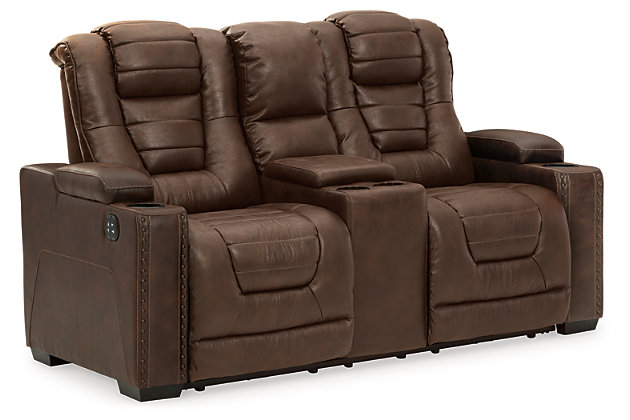 When it comes to style, you’ve got game. Rest assured, the Owner’s Box power reclining loveseat is sure to win you over with its ultra-cool looks and major league features. Showcasing all the bells and whistles, this designer reclining loveseat is inspired by sports car interiors—with a fabulous faux leather accentuated with horizonal channel tufting. An advanced one-touch power control with an Easy View™ power headrest puts you in the driver’s seat. On top of a cup holder and hidden storage on each armrest, you’ve got a center console with two more cup holders and storage for remotes and more.Dual-sided recliner | One-touch power control with adjustable positions | Easy View™ adjustable headrest | Corner-blocked frame with metal reinforced seat | Attached cushions | High-resiliency foam cushions wrapped in thick poly fiber | Faux leather upholstery | Each armrest includes storage compartment and cup holder | Extended ottoman for enhanced comfort | Center console with 2 cup holders and hidden storage | Power cord included; UL Listed | Exposed feet with faux wood finish | Estimated Assembly Time: 15 Minutes