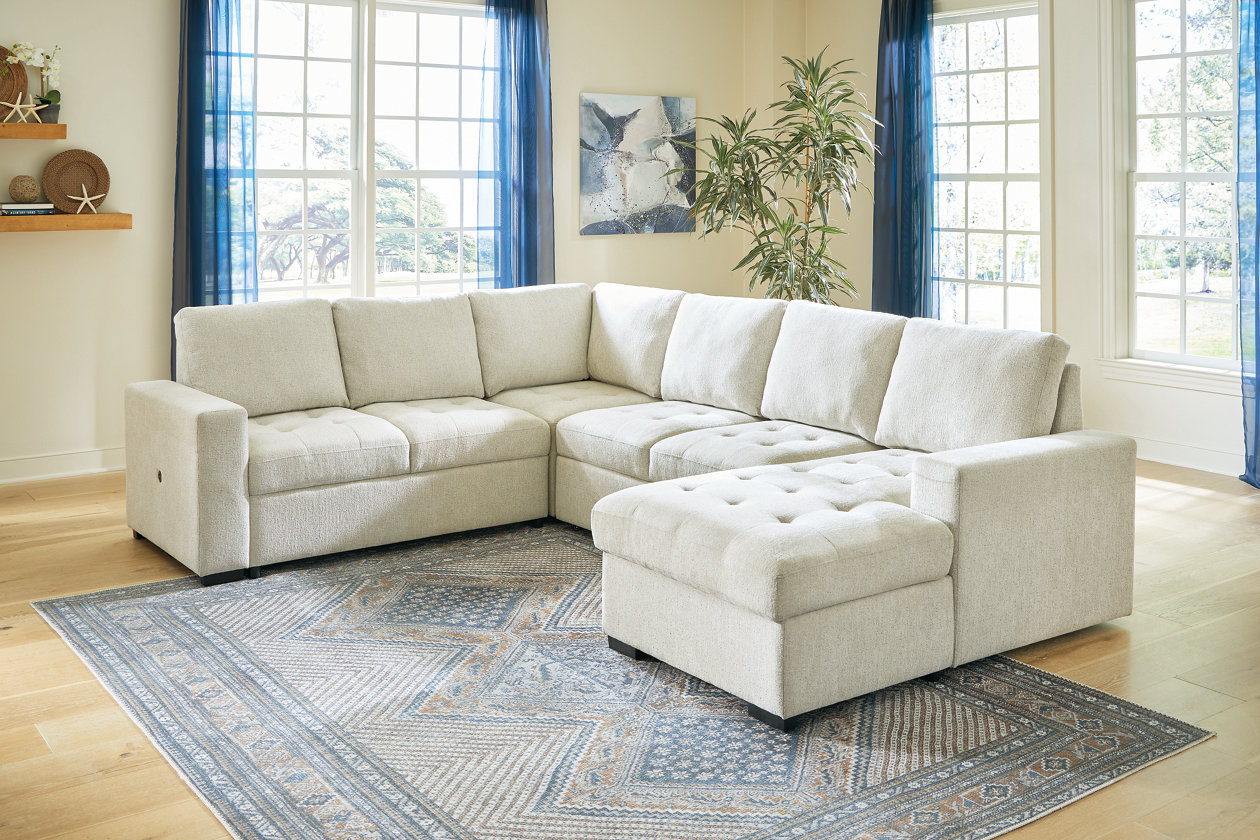 Millcoe 3-Piece Sectional with Pop Up Bed | Ashley