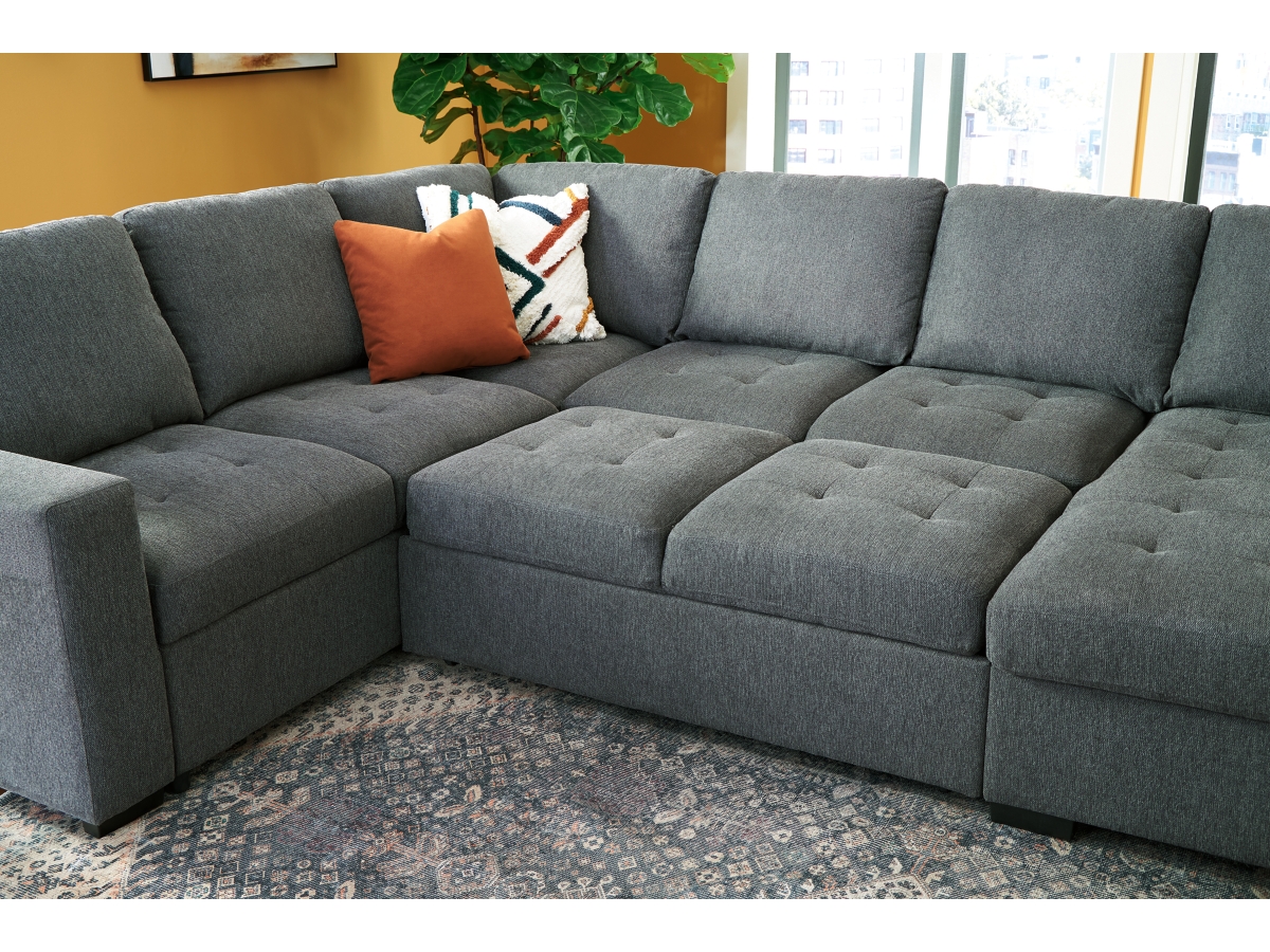 Millcoe 3 Piece Sectional with Pop Up Bed Ashley