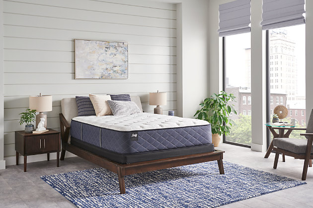 Drift off to comfortably cool slumber on the Surrey Lane II firm twin XL mattress. It features trusted motion-reducing encased coils and the exclusive CoreSupport™ Center. The DuraFlex™ Coil Edge increases durability, MoistureProtect™ helps keep you cool, and Surface-Guard Technology™ keeps the mattress protected. Available in a tight top firm.ComfortLoft™ cover with MoistureProtect™ and AllergenProtect™ | Quilt: FlameGuard™ fiber, 2" x 0.5" SealyComfort soft foam, CoreSupport™ Center with 0.5" SealyComfort gel foam | Comfort layers: 2" SealySupport soft foam, 1.5" SealySupport firm foam, 0.5" SealyComfort gel memory foam | 4 vertical handles | Sealy StabilityPlus™ innerspring | 911 coil count | DuraFlex™ Coil Edge | 1" SealySupport firm foam base | 14.5" profile