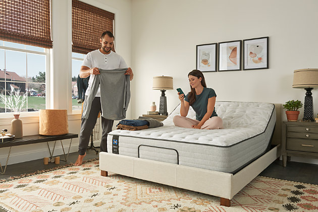 Drift off to comfortably cool, soft slumber on the Sealy Surrey Lane II soft twin mattress. It features trusted motion-reducing encased coils and the exclusive CoreSupport™ Center. The DuraFlex™ Coil Edge increases durability, MoistureProtect™ helps keep you cool, and Surface-Guard Technology™ keeps the mattress protected. Available in a tight top soft. ComfortLoft™ cover with MoistureProtect™ and AllergenProtect™ | Quilt: FlameGuard™ fiber, 2" x 0.5" SealyComfort soft foam, CoreSupport™ Center with 0.5" SealyComfort gel foam | Comfort layers: 2" SealySupport soft foam, 1.5" SealySupport firm foam, 0.5" SealyComfort gel memory foam | 4 vertical handles | Sealy StabilityPlus™ innerspring | 911 coil count | DuraFlex™ Coil Edge | 1" SealySupport firm foam base | 14.5" profile