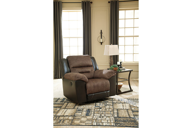 Every day is a good day with the Earhart rocker recliner around. Take a load off and forget your worries as you ease back into the luxurious feel of suede-like fabric. Faux leather covers the outside parts for an elevated look. Need more comfort and support for your body? Cue the deep seating and tall back. Contrast jumbo stitching adds an element of style to the cushions.Corner-blocked frame with metal reinforced seat | Attached back and seat cushions | Pull tab reclining motion | High-resiliency foam cushions wrapped in thick poly fiber | Polyester/polyurethane interior upholstery; vinyl/polyester/polyurethane exterior upholstery | Estimated Assembly Time: 15 Minutes