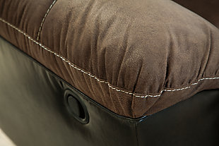 Every day is a good day with the Earhart reclining loveseat around. Take a load off and forget your worries as you ease back into the luxurious feel of suede-like fabric. Faux leather covers the outside parts for an elevated look. Need more comfort and support for your body? Cue the deep seating and tall back. Contrast jumbo stitching adds an element of style to the cushions. Easily place drinks and small living room essentials in the center storage console with cup holders.Corner-blocked frame with metal reinforced seat | Attached back and seat cushions | Pull tab reclining motion | Lift-top storage console and 2 cup holders | High-resiliency foam cushions wrapped in thick poly fiber | Polyester/polyurethane interior upholstery; vinyl/polyester/polyurethane exterior upholstery | Estimated Assembly Time: 15 Minutes