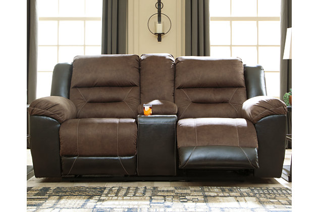 Every day is a good day with the Earhart reclining loveseat around. Take a load off and forget your worries as you ease back into the luxurious feel of suede-like fabric. Faux leather covers the outside parts for an elevated look. Need more comfort and support for your body? Cue the deep seating and tall back. Contrast jumbo stitching adds an element of style to the cushions. Easily place drinks and small living room essentials in the center storage console with cup holders.Corner-blocked frame with metal reinforced seat | Attached back and seat cushions | Pull tab reclining motion | Lift-top storage console and 2 cup holders | High-resiliency foam cushions wrapped in thick poly fiber | Polyester/polyurethane interior upholstery; vinyl/polyester/polyurethane exterior upholstery | Estimated Assembly Time: 15 Minutes