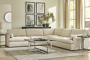 Blending a fresh, clean aesthetic with cloud-like comfort that’s impossible to resist, the Tanavi sectional sets the scene for living the dream. Whether your look is warm and cozy modern farmhouse or cool, crisp and contemporary, this masterfully crafted modular sectional tantalizes with feather/fiber blend reversible cushions with pillowy plushness and a linen-like fabric that’s a breath of fresh air. Slim track arms and structural bolster pillows enhance the experience.Includes 5 pieces: 2 armless chairs, left-arm facing corner chair, right-arm facing corner chair and wedge | "Left-arm" and "right-arm" describe the position of the arm when you face the piece | Corner-blocked frame | Reversible seat/back cushions | Seat cushions with feather/fiber blend encasing a foam core | Polyester upholstery | Bolster pillows included | Platform foundation system resists sagging 3x better than spring system after 20,000 testing cycles by providing more even support | Smooth platform foundation maintains tight, wrinkle-free look without dips or sags that can occur over time with sinuous spring foundations | Estimated Assembly Time: 15 Minutes