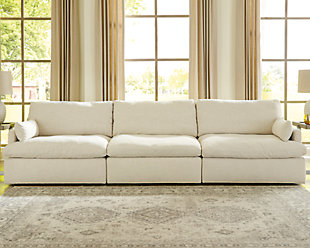 Blending a fresh, clean aesthetic with cloud-like comfort that’s impossible to resist, the Tanavi sofa sets the scene for living the dream. Whether your look is warm and cozy modern farmhouse or cool, crisp and contemporary, this masterfully crafted modular sofa tantalizes, with feather-fiber blend reversible cushions with pillowy plushness and a linen-like fabric that’s a breath of fresh air. Slim track arms and structural bolster pillows enhance the experience.Includes armless chair, left-arm facing corner chair and right-arm facing corner chair | "Left-arm" and "right-arm" describe the position of the arm when you face the piece | Modular pieces can float anywhere; sides are finished (with no connectors)  | Corner-blocked frame | Reversible seat/back cushions | Seat cushions with feather-fiber blend encasing a foam core | Polyester upholstery | Bolster pillows included | Platform foundation system resists sagging 3x better than spring system after 20,000 testing cycles by providing more even support | Smooth platform foundation maintains tight, wrinkle-free look without dips or sags that can occur over time with sinuous spring foundations | Estimated Assembly Time: 10 Minutes