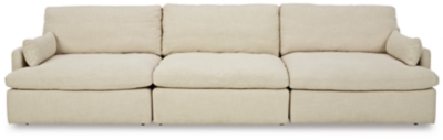 Blending a fresh, clean aesthetic with cloud-like comfort that’s impossible to resist, the Tanavi sofa sets the scene for living the dream. Whether your look is warm and cozy modern farmhouse or cool, crisp and contemporary, this masterfully crafted modular sofa tantalizes, with feather-fiber blend reversible cushions with pillowy plushness and a linen-like fabric that’s a breath of fresh air. Slim track arms and structural bolster pillows enhance the experience.Includes armless chair, left-arm facing corner chair and right-arm facing corner chair | "Left-arm" and "right-arm" describe the position of the arm when you face the piece | Modular pieces can float anywhere; sides are finished (with no connectors)  | Corner-blocked frame | Reversible seat/back cushions | Seat cushions with feather-fiber blend encasing a foam core | Polyester upholstery | Bolster pillows included | Platform foundation system resists sagging 3x better than spring system after 20,000 testing cycles by providing more even support | Smooth platform foundation maintains tight, wrinkle-free look without dips or sags that can occur over time with sinuous spring foundations | Estimated Assembly Time: 10 Minutes