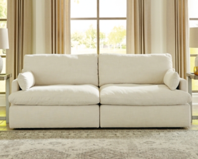 Blending a fresh, clean aesthetic with cloud-like comfort that’s impossible to resist, the Tanavi loveseat sets the scene for living the dream. Whether your look is warm and cozy modern farmhouse or cool, crisp and contemporary, this masterfully crafted modular loveseat tantalizes with feather/fiber blend reversible cushions with pillowy plushness and a linen-like fabric that’s a breath of fresh air. Slim track arms and structural bolster pillows enhance the experience.Includes 2 pieces: left-arm facing corner chair and right-arm facing corner chair | "Left-arm" and "right-arm" describe the position of the arm when you face the piece | Corner-blocked frame | Reversible seat/back cushions | Seat cushions with feather/fiber blend encasing a foam core | Polyester upholstery | Bolster pillows included | Platform foundation system resists sagging 3x better than spring system after 20,000 testing cycles by providing more even support | Smooth platform foundation maintains tight, wrinkle-free look without dips or sags that can occur over time with sinuous spring foundations | Estimated Assembly Time: 5 Minutes