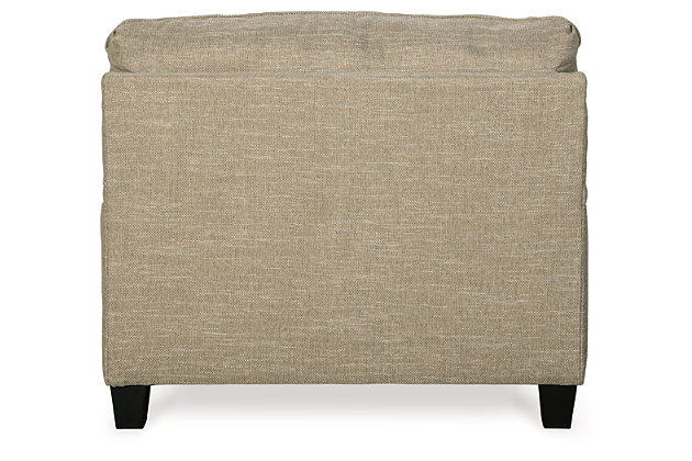With its elegant Charles of London arms, soothing shades and sumptuous comfort, the Almanza oversized chair brings a classic look beautifully into the present. Loaded with multi-tonal interest, the chair's wheat-hue upholstery is a fresh choice in neutrals. Marvelously muted ikat pillow enhances the warm, cozy feel, while clean-lined tapered feet in a dark finish infuse modern appeal.Corner-blocked frame | Attached back and loose seat cushions | High-resiliency foam cushions wrapped in thick poly fiber | Accent pillow included | Pillow with soft polyfill | Polyester/polypropylene upholstery | Polyester/polypropylene; polyester/rayon/acrylic/linen pillow | Exposed feet with faux wood finish | Platform foundation system resists sagging 3x better than spring system after 20,000 testing cycles by providing more even support | Smooth platform foundation maintains tight, wrinkle-free look without dips or sags that can occur over time with sinuous spring foundations