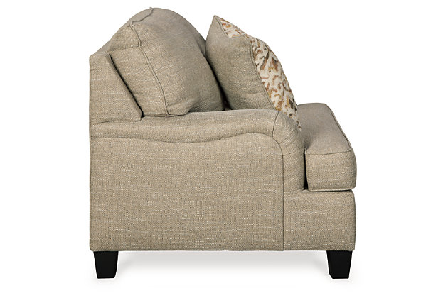 With its elegant Charles of London arms, soothing shades and sumptuous comfort, the Almanza oversized chair brings a classic look beautifully into the present. Loaded with multi-tonal interest, the chair's wheat-hue upholstery is a fresh choice in neutrals. Marvelously muted ikat pillow enhances the warm, cozy feel, while clean-lined tapered feet in a dark finish infuse modern appeal.Corner-blocked frame | Attached back and loose seat cushions | High-resiliency foam cushions wrapped in thick poly fiber | Accent pillow included | Pillow with soft polyfill | Polyester/polypropylene upholstery | Polyester/polypropylene; polyester/rayon/acrylic/linen pillow | Exposed feet with faux wood finish | Platform foundation system resists sagging 3x better than spring system after 20,000 testing cycles by providing more even support | Smooth platform foundation maintains tight, wrinkle-free look without dips or sags that can occur over time with sinuous spring foundations