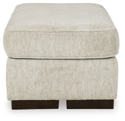 Decidedly modern with a sense of relaxed ease, the Alesandra ottoman looks at home in so many different places and spaces. Sporting a subtle chevron texture, the parchment-tone upholstery takes neutral to new heights. Providing a highly distinctive look: low-to-the-floor block feet in a warm wood-tone finish.Corner-blocked frame | Firmly cushioned | High-resiliency foam cushion wrapped in thick poly fiber | Polyester upholstery | Exposed feet with faux wood finish