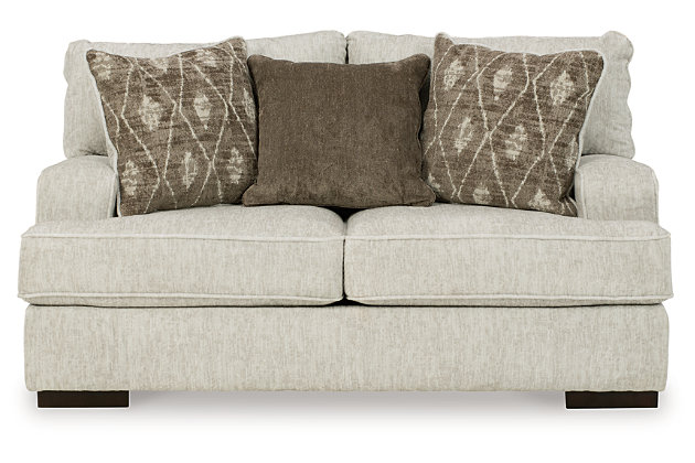 Decidedly modern with a sense of relaxed ease, the Alesandra loveseat looks at home in so many different places and spaces. Providing a highly distinctive look: substantial track arms with curved cornering, wrapped t-cushions and low-to-the-floor block feet in a warm wood-tone finish. Sporting a subtle chevron texture, the parchment-tone upholstery takes neutral to new heights.Corner-blocked frame | Loose back and reversible seat cushions | High-resiliency foam cushions wrapped in thick poly fiber | Polyester upholstery | Throw pillows included | Pillows with soft polyfill | Exposed feet with faux wood finish | Platform foundation system resists sagging 3x better than spring system after 20,000 testing cycles by providing more even support | Smooth platform foundation maintains tight, wrinkle-free look without dips or sags that can occur over time with sinuous spring foundations