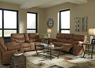 Rock the cool look of leather minus the hefty price tag with the Boxberg power reclining sofa. Rich with tonal variation, the indulgently soft upholstery sure looks like the real thing. And talk about indulgent comfort. Double stuffed armrests and sumptuous cushions cradle and support in all the right places. Distinctive scooped stitching enhances this reclining sofa’s contemporary flair.Dual-sided recliner; middle seat remains stationary | One-touch power control with adjustable positions | Corner-blocked frame with metal reinforced seat | Attached cushions | High-resiliency foam cushions wrapped in thick poly fiber | Polyester/polyurethane upholstery | Power cord included; UL listed | Excluded from promotional discounts and coupons