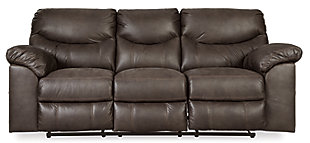 Rock the cool look of leather minus the hefty price tag with the Boxberg power reclining sofa. Rich with tonal variation, the indulgently soft upholstery sure looks like the real thing. And talk about indulgent comfort. Double stuffed armrests and sumptuous cushions cradle and support in all the right places. Distinctive scooped stitching enhances this reclining sofa’s contemporary flair.Dual-sided recliner; middle seat remains stationary | One-touch power control with adjustable positions | Corner-blocked frame with metal reinforced seat | Attached cushions | High-resiliency foam cushions wrapped in thick poly fiber | Polyester/polyurethane upholstery | Power cord included; UL listed | Estimated Assembly Time: 15 Minutes