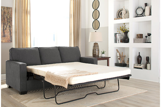 What a fresh awakening in minimalist design. Striking a highly linear pose with track arms and crisp box cushions, the Zeb queen sofa sleeper is beautiful proof that less is more. Wrapped in a richly neutral microfiber upholstery, Zeb includes an upgraded memory foam mattress to make your overnight guests that much more comfortable.Corner-blocked frame | Attached back and loose seat cushions | High-resiliency foam cushions wrapped in thick poly fiber | Polyester/nylon upholstery | Exposed feet with faux wood finish | Included bi-fold queen memory foam mattress sits atop a supportive steel frame | Memory foam provides better airflow for a cooler night’s sleep | Memory foam encased in damask ticking | Excluded from promotional discounts and coupons