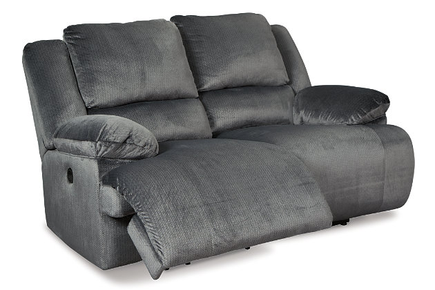 -scale comfort is yours with the Clonmel reclining power loveseat. With supremely padded back, seat and arm cushions, it's the hero for ultimate relaxation. Microfiber upholstery is welcoming, soft and luxuriously covers the extra-wide seats. Recline back and kick up your feet to bolster your comfort level even more.Polyester microfiber upholstery | Dual-sided recliner | Corner-blocked frame with metal reinforced seats | Attached backs and seat cushions | One-touch power controls with adjustable positions | High-resiliency foam cushions wrapped in thick poly fiber | Power cord included; UL Listed | Estimated Assembly Time: 15 Minutes