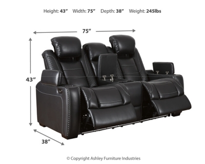 The Party Time power reclining loveseat takes its cue from luxury automobiles with lattice- and cross-hatch stitching, for a richly tailored aesthetic that gives you plenty of reasons to celebrate. Sumptuously padded cushions and dramatic midnight black faux leather upholstery add to the indulgence. When it’s time to rev up the action, the loveseat’s dual reclining bucket seats, Easy View™ power adjustable headrests and center console keep you in the driver’s seat. Dual-sided recliner | One-touch power controls with adjustable positions | Easy View™ power adjustable headrests | Corner-blocked frame with metal reinforced seats | Attached backs and seat cushions | High-resiliency foam cushions wrapped in thick poly fiber | Polyester/polyurethane upholstery | Includes USB charging port in each power control | Flip up padded armrests with hidden storage | Center console with cup holders and underneath storage | Ambient blue LED lighting on cup holders and base for a theater-style experience | Power cord included; UL Listed | Estimated Assembly Time: 15 Minutes