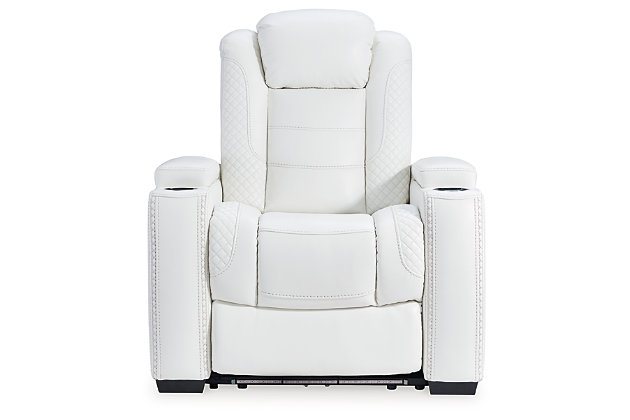 The Party Time power reclining loveseat takes its cue from luxury automobiles with lattice and crosshatch stitching, for a richly tailored aesthetic that gives you plenty of reasons to celebrate. Sumptuously padded cushions and crisp white faux leather upholstery add to the indulgence. When it’s time to rev up the action, the dual reclining bucket seats, Easy View™ power adjustable headrests and center console with docking station keep you in the driver’s seat. Ambient blue LED lighting on the base and cup holders completes the theater-style experience.Polyester/polyurethane upholstery | Corner-blocked frame with metal reinforced seat | Attached back and seat cushions | High-resiliency foam cushions wrapped in thick poly fiber | One-touch power control with adjustable positions, Easy View™ adjustable headrest and USB plug-in | Flip up padded armrests with hidden storage | LED lighting on cup holders and base for theater-style experience | Power cord included; UL Listed | Estimated Assembly Time: 15 Minutes