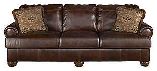 The classic look of natural, weatherworn leather. Fall in love with how well it fits into your design scheme with the Axiom sofa. It’s upholstered in rich leather for that buttery soft feel and rustic appeal. Plush rolled arms and high-character details such as box-stitched cushions and detailed bun feet beautifully evoke casual charm.Corner-blocked frame | Attached back and loose seat cushions | UltraPlush cushions remain loftier longer | 2 layers of cushioned comfort: High-density foam core encased in thick polyfill | 2 accent pillows included | Pillows with soft polyfill | Polyester/rayon; polyester/polypropylene pillows | Genuine leather upholstery | Exposed feet with faux wood finish
