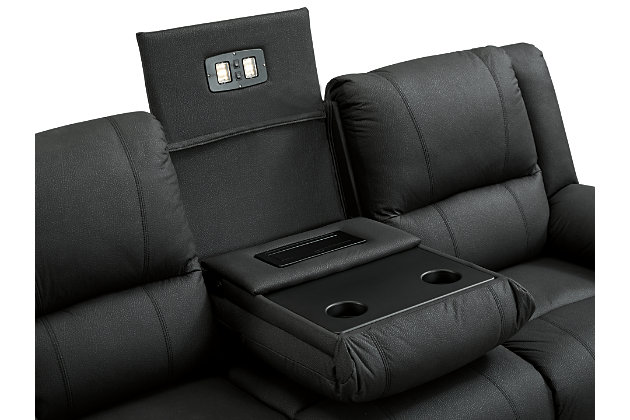 The Delafield power reclining sofa leaves a lasting impression. Chic black upholstery, pillow top armrests and a thick bustle-back cushion provide irresistible comfort. Individually reclining seats and drop-down table add everyday convenience. Perfect for family spaces or home theater seating.Dual-sided recliner; middle seat remains stationary | Attached cushions | Black upholstery | Storage console with 2 cup holders | Hidden drop-down table in the center seat | Power reclining mechanism | Power cord included | Estimated Assembly Time: 15 Minutes
