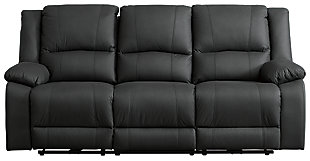 The Delafield power reclining sofa leaves a lasting impression. Chic black upholstery, pillow top armrests and a thick bustle-back cushion provide irresistible comfort. Individually reclining seats and drop-down table add everyday convenience. Perfect for family spaces or home theater seating.Dual-sided recliner; middle seat remains stationary | Attached cushions | Black upholstery | Storage console with 2 cup holders | Hidden drop-down table in the center seat | Power reclining mechanism | Power cord included | Estimated Assembly Time: 15 Minutes