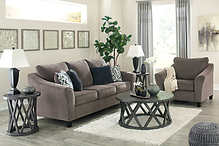 The Nemoli queen sofa sleeper sets the scene for a modern space full of casual flair. Its textured chenille with solid microfiber upholstery provides a luxuriously soft feel that’s inviting. Gently flared arms and plush seat cushions welcome comfort and relaxation. The on-trend slate-colored upholstery offers a perfect background for the four decorative pillows to pop with beauty. Pull-out queen mattress in quality memory foam comfortably accommodates overnight guests.Polyester/textured chenille with solid microfiber upholstery | High-resiliency foam cushions wrapped in thick poly fiber | Corner-blocked frame | Exposed tapered feet | Loose back and seat cushions; non-reversible | Included bi-fold queen memory foam mattress sits atop a supportive steel frame | Memory foam provides better airflow for a cooler night’s sleep | Includes 2 button-tufted pillows and 2 accent pillows made of polyester fabric