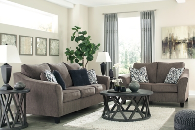 The Nemoli queen sofa sleeper sets the scene for a modern space full of casual flair. Its textured chenille with solid microfiber upholstery provides a luxuriously soft feel that’s inviting. Gently flared arms and plush seat cushions welcome comfort and relaxation. The on-trend slate-colored upholstery offers a perfect background for the four decorative pillows to pop with beauty. Pull-out queen mattress in quality memory foam comfortably accommodates overnight guests.Polyester/textured chenille with solid microfiber upholstery | High-resiliency foam cushions wrapped in thick poly fiber | Corner-blocked frame | Exposed tapered feet | Loose back and seat cushions; non-reversible | Included bi-fold queen memory foam mattress sits atop a supportive steel frame | Memory foam provides better airflow for a cooler night’s sleep | Includes 2 button-tufted pillows and 2 accent pillows made of polyester fabric