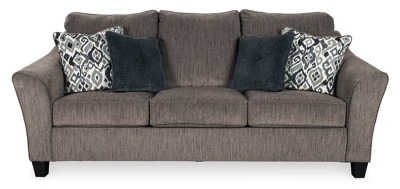 The Nemoli queen sofa sleeper sets the scene for a modern space full of casual flair. Its textured chenille with solid microfiber upholstery provides a luxuriously soft feel that’s inviting. Gently flared arms and plush seat cushions welcome comfort and relaxation. The on-trend slate-colored upholstery offers a perfect background for the four decorative pillows to pop with beauty. Pull-out queen mattress in quality memory foam comfortably accommodates overnight guests.Polyester/textured chenille with solid microfiber upholstery | High-resiliency foam cushions wrapped in thick poly fiber | Corner-blocked frame | Exposed tapered feet | Loose back and seat cushions; non-reversible | Included bi-fold queen memory foam mattress sits atop a supportive steel frame | Memory foam provides better airflow for a cooler night’s sleep | Includes 2 button-tufted pillows and 2 accent pillows made of polyester fabric