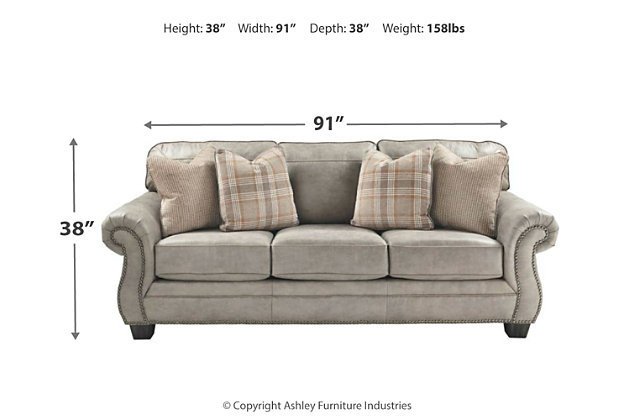 Seamlessly merging classic elements with modern trends, the Olsberg sofa invites you to bring home the best of then and now. Wrapped in a fabulous steel gray upholstery with sumptuous suede-like feel, this easy-elegant sofa is dressed to impress with updated roll arm styling and tailored touches including nailhead trim and window pane stitching. What you can’t see is every bit as impressive. Reversible seat cushions crafted with our highest quality coils provide a bit of bounce and plenty of comfort and support.Corner-blocked frame | Attached back and loose cushions | Seat cushions with ultra-supportive, pocketed coils | 4 accent pillows included | Pillows with soft feather inserts; zippered access | Polyester/polyurethane upholstery; polyester and polyester/polyurethane pillows | Nailhead trim | Exposed feet with faux wood finish | Platform foundation system resists sagging 3x better than spring system after 20,000 testing cycles by providing more even support | Smooth platform foundation maintains tight, wrinkle-free look without dips or sags that can occur over time with sinuous spring foundations