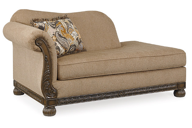 The Westerwood left-arm facing chaise takes traditional style in a new direction. Loaded with flair, the dark-finished exposed frame with artful detailing has us yearning for yesteryear. Wrapped in a richly neutral chenille upholstery and complemented with a jacquard paisley pillow, this instant classic chaise takes the past right into the present.Corner-blocked frame | Attached back and loose seat cushions | High-resiliency foam cushions wrapped in thick poly fiber | Decorative pillow included | Pillow with soft polyfill | Polyester upholstery | Polyester; polyester/rayon pillow | Exposed feet and frame with faux wood finish