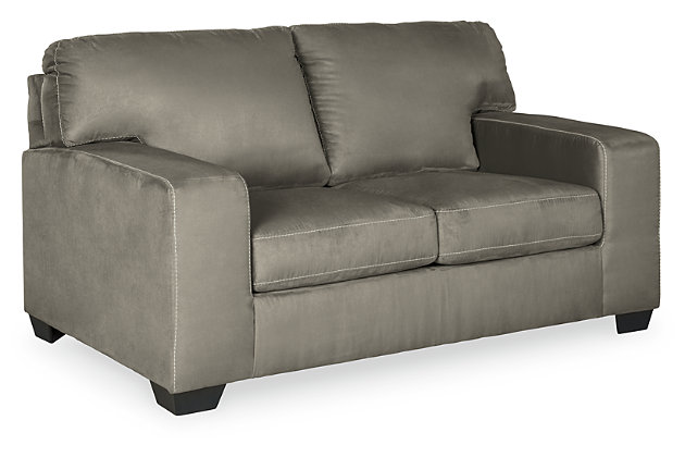 Modern comfort never looked so good. Sporting wide track arms, box cushions and jumbo stitching for high-fashion flair, the Kanosh sofa and loveseat are the ultimate choice in comfortably cool, contemporary style. Indulgent with a suede-like touch and upscale feel, the plush upholstery is the stuff dreams are made of.Includes sofa and loveseat | Corner-blocked frame | Attached back and loose seat cushions | High-resiliency foam cushions wrapped in thick poly fiber | Polyester upholstery | Exposed feet with faux wood finish | Platform foundation system resists sagging 3x better than spring system after 20,000 testing cycles by providing more even support | Smooth platform foundation maintains tight, wrinkle-free look without dips or sags that can occur over time with sinuous spring foundations