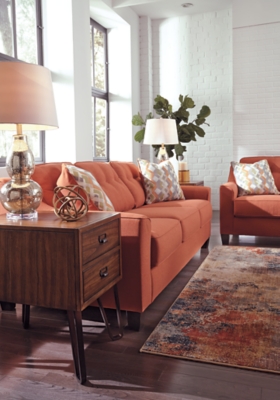 Ashley furniture orange deals couch