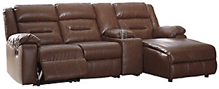 When you look as cool and feel as great as the Coahoma 4-piece sectional with power, it’s easy to make yourself at home. Proof that large-scale comfort doesn’t mean sacrificing high fashion, this decidedly modern sectional entices with clean lines, channel tufted styling and a chestnut brown upholstery that’s truly faux leather at its best. With space efficiency in mind, the sectional’s zero wall power recliner with USB plug-in at your fingertips provides the ultimate way to recline by design.Includes 4 pieces: right-arm facing corner chaise, armless chair, console with storage and left-arm facing zero wall power recliner | One-touch power control with adjustable positions | Corner-blocked frames; recliner with metal reinforced seat | Attached cushions | High-resiliency foam cushions wrapped in thick poly fiber | Zero wall recliner design requires minimal space between wall and chair back | Polyurethane/polyester/cotton interior upholstery; vinyl/polyester/polyurethane exterior upholstery | USB charging port | Power cord included; UL Listed | Estimated Assembly Time: 15 Minutes