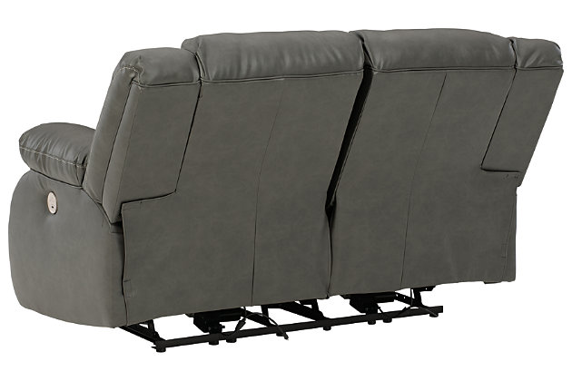 If highly contemporary looks and a heavenly feel sit well with you, rest your eyes on the Denoran reclining power loveseat. Decadently soft, the easy-care faux leather upholstery is enriched with jumbo contrast stitching and dramatic cut-and-sew lines for fashion-forward flair. Radius cut arm frame adds cool, curvaceous interest. At your fingertips: one-touch power control with a zero-draw USB plug-in that’s not only convenient but also energy efficient. When it comes to high style at a down-to-earth price, this power reclining loveseat really brings it home.Dual-sided recliner | One-touch power control with adjustable positions and zero-draw USB plug-in | Zero-draw technology only consumes power when the USB receptacle is in use | Vinyl/polyester/polyurethane upholstery | Corner-blocked frame with metal reinforced seat | Attached back and seat cushions | Exaggerated headrest | High-resiliency foam cushions wrapped in thick poly fiber | Power cord included; UL Listed