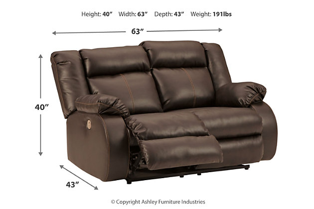 If highly contemporary looks and a heavenly feel sit well with you, rest your eyes on the Denoran reclining power loveseat. Decadently soft, the easy-care faux leather upholstery is enriched with jumbo contrast stitching and dramatic cut-and-sew lines for fashion-forward flair. Radius cut arm frame adds cool, curvaceous interest. At your fingertips: one-touch power control with a zero-draw USB plug-in that’s not only convenient but also energy efficient. When it comes to high style at a down-to-earth price, this power reclining loveseat really brings it home.Dual-sided recliner | One-touch power control with adjustable positions and zero-draw USB plug-in | Zero-draw technology only consumes power when the USB receptacle is in use | Vinyl/polyester/polyurethane upholstery | Corner-blocked frame with metal reinforced seat | Attached back and seat cushions | Exaggerated headrest | High-resiliency foam cushions wrapped in thick poly fiber | Power cord included; UL Listed
