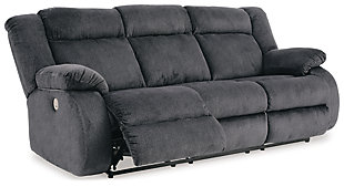 If highly contemporary looks and a heavenly feel sit well with you, rest your eyes on the Burkner reclining power sofa. Padded velvet upholstery has a plush high pile that's so soft to the touch. Jumbo contrast stitching adds fashion-forward flair, while radius cut arm frame incorporates cool, curvaceous interest. At your fingertips: one-touch power control with a zero-draw USB plug-in that’s not only convenient but also energy efficient. When it comes to high style at a down-to-earth price, this power reclining sofa really brings it home.Dual-sided recliner; middle seat remains stationary | One-touch power control with adjustable positions and zero-draw USB plug-in | Zero-draw technology only consumes power when the USB receptacle is in use | Velvet polyester upholstery | Corner-blocked frame with metal reinforced seat | Attached back and seat cushions | Exaggerated headrest | High-resiliency foam cushions wrapped in thick poly fiber | Power cord included; UL Listed