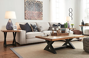 Topped with a rich, thick slab of sustainable mango wood, bathed in a light rustic finish, Wesling coffee table wows with clean-lined style and a hearty presence. Classic X-brace base with stretcher is crafted of a contrasting metal for a merge of mixed media elements and a touch of modern industrial.Made of wood and metal | Mango wood tabletop with plank design | Metal base with rustic black finish | Assembly required