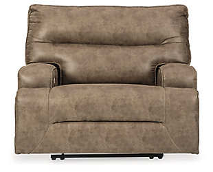 For those that love the cool look of leather but long for the warm feel of fabric, the Hazenburg zero wall power recliner delivers both with ease. Its high-performance padded faux leather is remarkably durable and easy to clean, just the thing for family spaces. When it’s time to relax, the one-touch power control puts the perfect position at your fingertips. Channel-stitched back cushions provide indulgent lumbar support for maximum seating comfort—not to mention fashion-forward flair.One-touch power control with adjustable positions and USB plug-in | Corner-blocked frame with metal reinforced seat | Attached cushions | High-resiliency foam cushions wrapped in thick poly fiber | Polyester/polyurethane (faux leather) upholstery | Zero wall design requires minimal space between wall and chair back | Power cord included; UL Listed