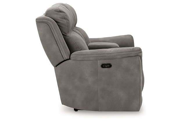 It’s time to rethink the way you relax—and time to experience the joys of the Next-Gen DuraPella power reclining loveseat. Taking a fashion-forward approach to the art of relaxation, the loveseat—with a one-touch power control and an energy-efficient USB plug-in—will elevate your style and raise your standard of living. Its zero-gravity mechanism lifts the ottoman higher than traditional recliners to improve circulation. And talk about low maintenance. This designer recliner is wrapped in durable, water-repellent upholstery that's family- and pet-friendly.Dual-sided recliner | One-touch power control with adjustable positions, Easy View™ adjustable headrest and zero-draw USB plug-in | Zero-draw technology only consumes power when the USB receptacle is in use | Corner-blocked frame with metal reinforced seat | Attached back and seat cushions | High-resiliency foam cushions wrapped in thick poly fiber | Zero-gravity mechanism (raises the ottoman to 23" off the floor for improved circulation) | Extended ottoman for enhanced comfort | Water-repellent polyester/polyurethane (faux leather) upholstery | Power cord included; UL Listed | Estimated Assembly Time: 15 Minutes