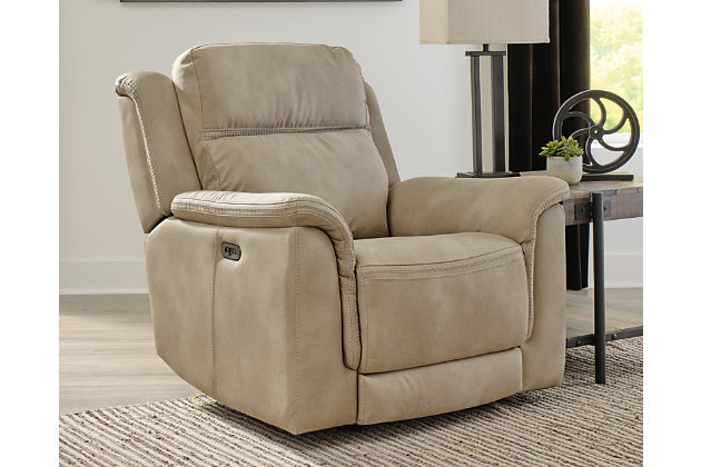 It’s time to rethink the way you relax—and time to experience the joys of the Next-Gen DuraPella power recliner. Taking a fashion-forward approach to the art of relaxation, the recliner—with a one-touch power control and an energy-efficient USB plug-in—will elevate your style and raise your standard of living. Its zero-gravity mechanism lifts the ottoman higher than traditional recliners to improve circulation. And talk about low maintenance. This designer recliner is wrapped in durable, water-repellent upholstery that's family- and pet-friendly.One-touch power control with adjustable positions, Easy View™ adjustable headrest and zero-draw USB plug-in | Zero-draw technology only consumes power when the USB receptacle is in use | Corner-blocked frame with metal reinforced seat | Attached back and seat cushions | High-resiliency foam cushions wrapped in thick poly fiber | Zero-gravity mechanism (raises the ottoman to improve circulation) | Extended ottoman for enhanced comfort | Water-repellent polyester/polyurethane (faux leather) upholstery | Power cord included; UL Listed | Estimated Assembly Time: 15 Minutes