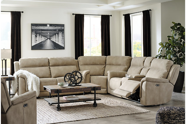 It’s time to rethink the way you relax—and time to experience the joys of the Next-Gen Durapella power reclining sectional. Taking a fashion-forward approach to the art of relaxation, the sectional—with a one-touch power control and an energy-efficient USB plug-in—will elevate your style and raise your standard of living. Its zero-gravity mechanism lifts the ottoman higher than traditional recliners to improve circulation. And talk about low maintenance. This designer sectional is wrapped in durable, water-repellent upholstery that's family- and pet-friendly.Includes 3 pieces: power reclining loveseat, power reclining sofa and wedge | One-touch power control with adjustable positions, Easy View™ adjustable headrest and zero-draw USB plug-in | Zero-draw technology only consumes power when the USB receptacle is in use | Corner-blocked frame with metal reinforced seat | Attached back and seat cushions | High-resiliency foam cushions wrapped in thick poly fiber | Zero-gravity mechanism (raises the ottoman for improved circulation) | Extended ottoman for enhanced comfort | Water-repellent polyester/polyurethane (faux leather) upholstery | Power cord included; UL Listed | Estimated Assembly Time: 55 Minutes