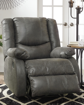 Make a big impression in a smaller footprint with the chicly styled Bladewood zero wall recliner. Thanks to its space-conscious design that requires a mere three inches between the wall and chair back, you can stretch out more efficiently. Wrapped in a fabulous faux leather loaded with pebbly texture and tonal variation that looks so natural, this designer recliner sports contoured tufting and contrasting baseball stitching for a style home run.Pull tab reclining motion | Zero wall design requires minimal space between wall and chair back | Corner-blocked frame with metal reinforced seat | Attached cushions | High-resiliency foam cushions wrapped in thick poly fiber | Polyester/polyurethane upholstery