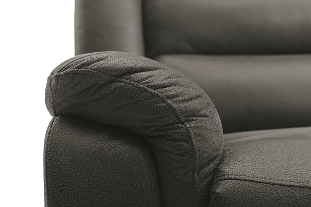Embrace contemporary comfort with the Welota reclining sofa. Its richly neutral upholstery and no-fuss design give a new meaning to relaxed refinement. A double bustle back and curved armrests round out the look.Dual-sided recliner; middle seat remains stationary | Attached cushions | Gray upholstery | Pull tab reclining motion | Hidden drop-down table in the center seat | Estimated Assembly Time: 15 Minutes